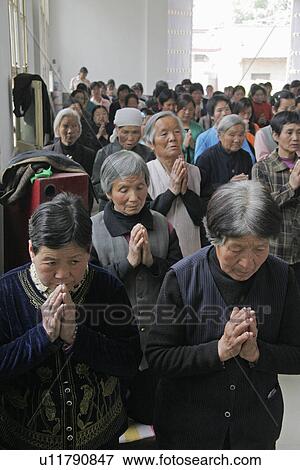 Stock Photo - catholic, person, mass, sunday, china, people. Fotosearch