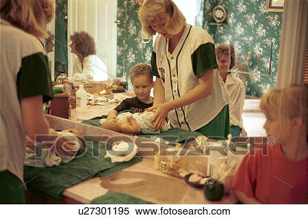 Stock Photography - child, daughter, kid, caring. Fotosearch