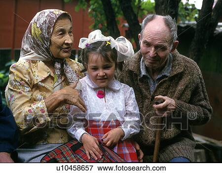 Stock Photo - child, people, couple, girl, house, family. Fotosearch