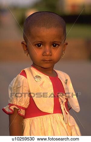 Stock Image - child, poses, earrings, kid, small. Fotosearch