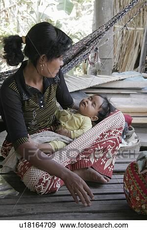 Stock Photo - children, baby, person, child, people, woman. Fotosearch