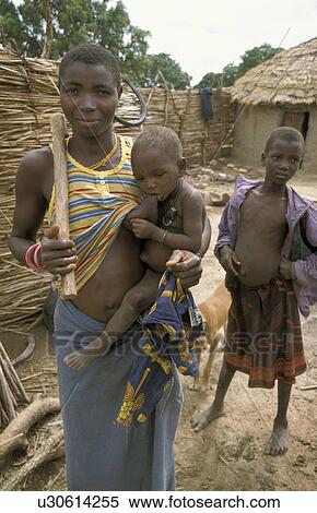 Stock Photography - children, woman, person, house, people, family. Fotosearch