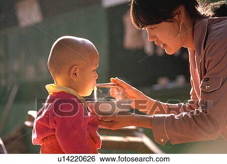 ching, feeds, chopsticks, noodles, baby, mother View Large Photo Image Stock Photograph - ching, feeds, chopsticks, noodles, baby, mother. Fotosearch