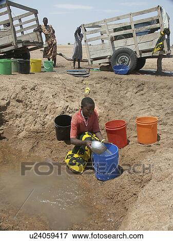 collecting, water, tanzania, person, people, woman View Large Photo Image Stock Photo - collecting, water, tanzania, person, people, woman. Fotosearch