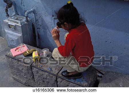 cooking, hispanic, kitchen, playing, girl, mexican View Large Photo Image Stock Photograph - cooking, hispanic, kitchen, playing, girl, mexican. Fotosearch