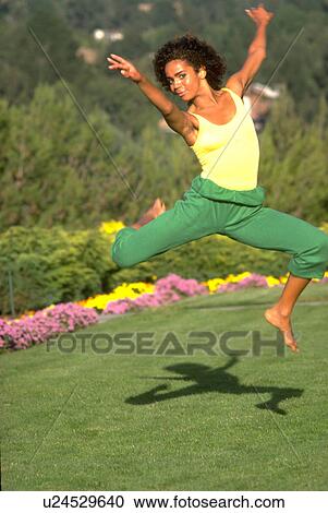 Stock Image - dancer, flowers, leaping, dance, spring, woman. Fotosearch