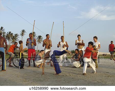 Stock Image - dancers, people, capoeira, brazil, person, beach. Fotosearch
