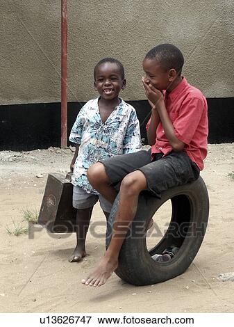 Stock Photo - daressalaam, sport, tanzania, children, person, people. Fotosearch