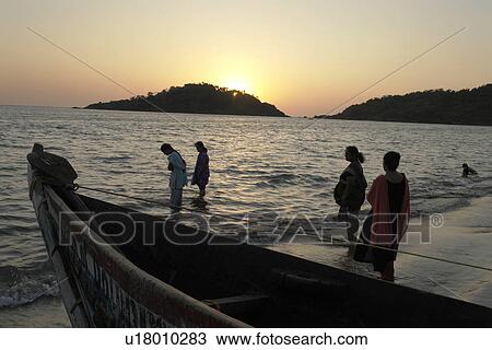 Stock Image - detail, people, bathers, india, person, beach. Fotosearch