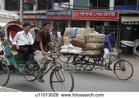 Stock Photo - dhaka, person, rickshaw, cycle, bangladesh, people. Fotosearch