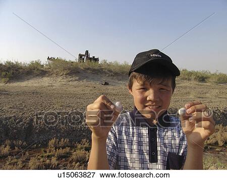 Stock Photo - disaster, person, environmental, asia, central, people. Fotosearch