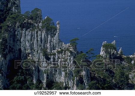 Stock Photo - envau, cliffs, mediterranean, overlooking, trees, white. Fotosearch