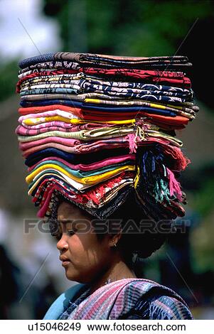 fabrics, woman, colorful, stack, female, balinese View Large Photo Image Stock Photo - fabrics, woman, colorful, stack, female, balinese. Fotosearch