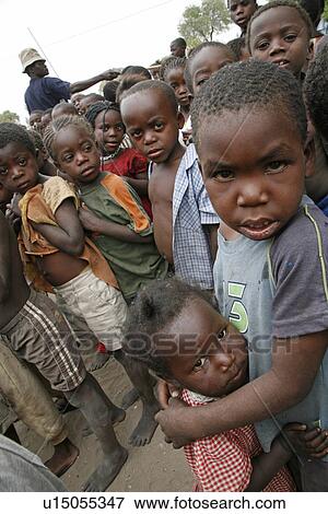 feeding, people, namibia, children, person, food View Large Photo Image Stock Photo - feeding, people, namibia, children, person, food. Fotosearch
