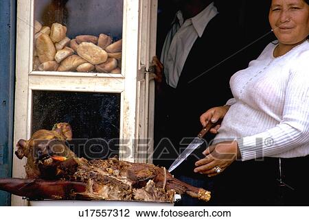 Stock Image - female, pig, suckling, cooking, woman. Fotosearch