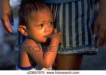 Stock Photography - filipino, people, home, kid, child, family. Fotosearch
