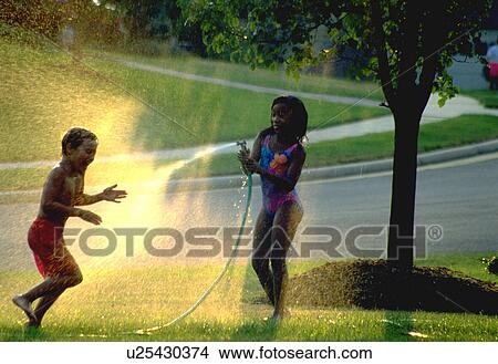 games, young, water, play, girls, two View Large Photo Image Picture - games, young, water, play, girls, two. Fotosearch