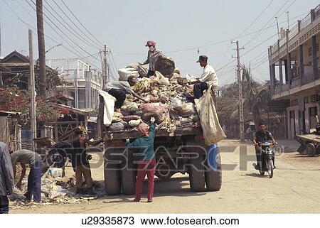garbage, person, collecting, truck, cambodia, people View Large Photo Image Stock Image - garbage, person, collecting, truck, cambodia, people. Fotosearch
