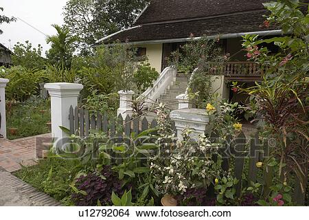 Picture - garden, house, beautiful, laos, person, people. Fotosearch