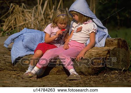 Stock Image - girl, two, children, nature, people. Fotosearch