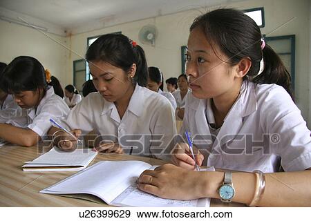 Stock Photo - girls, people, book, children, person, background. Fotosearch