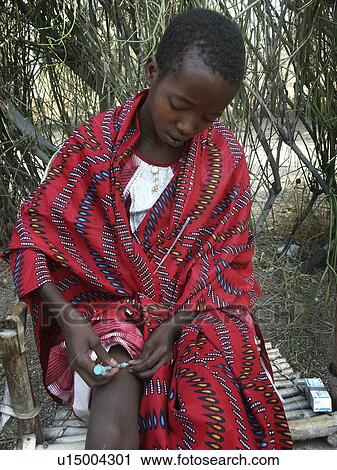 Stock Image - giving, person, tribalgirl, watatulu, tanzania, people. Fotosearch