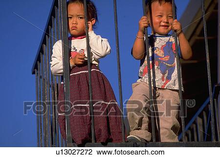 Stock Image - grumpy, people, happy, home, children, family. Fotosearch