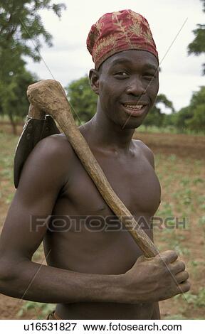 Stock Photo - hoe, person, holding, farmer, ghana, people. Fotosearch