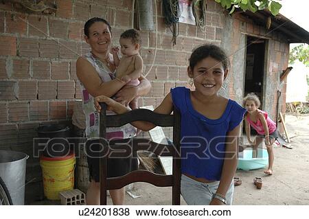 Stock Photo - home, people, children, person, house, woman. Fotosearch