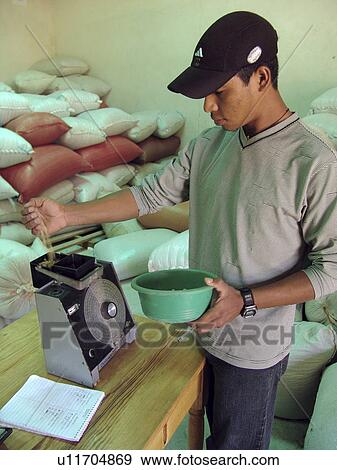 Stock Photo - humidity, coffee, testing, honduras, person, people. Fotosearch