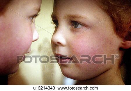 Stock Image - identity, sibling, love, staring, twins, girls. Fotosearch