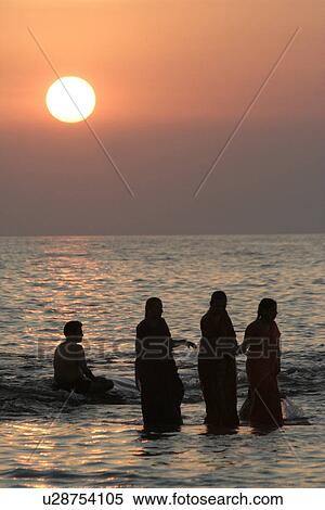 Stock Photography - india, people, women, sun, person, woman. Fotosearch