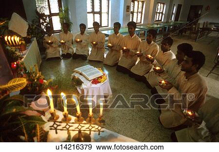 Stock Photo - india, person, candles, candle, 5431, people. Fotosearch