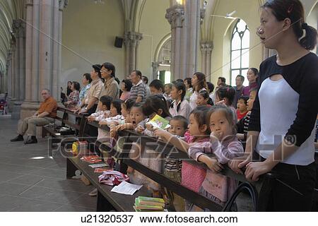 Stock Photo - inside, person, mass, sunday, china, people. Fotosearch