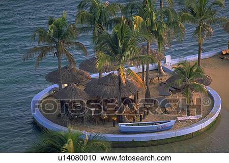Stock Image - island, house, huts, ocean, home, beach. Fotosearch