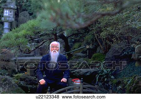 Stock Photo - japanese, male, old, garden, water. Fotosearch