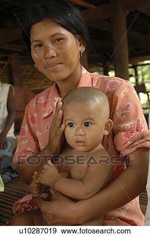 Stock Photo - kampong, people, mother, cambodia, person, baby. Fotosearch