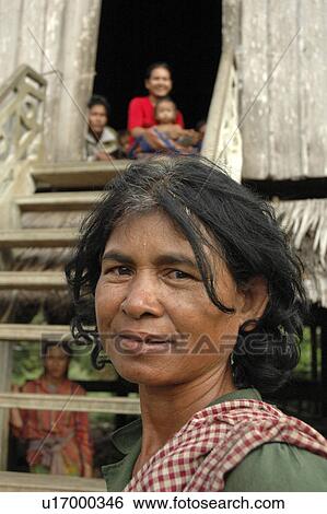 Stock Photograph - kampong, woman, cambodia, person, people, family. Fotosearch