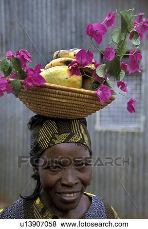 Stock Photo - kenya, woman, 6255, person, people, flower. Fotosearch