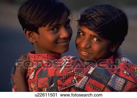 Stock Image - kids, children, embracing, boys, two, people. Fotosearch