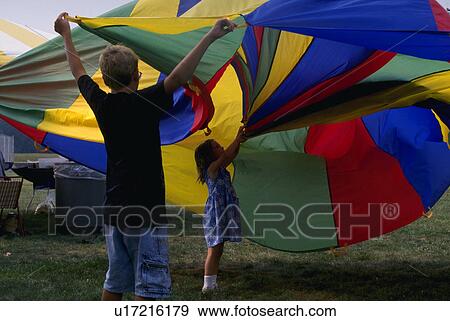 Stock Photo - kids, colorful, out, shaking, children. Fotosearch