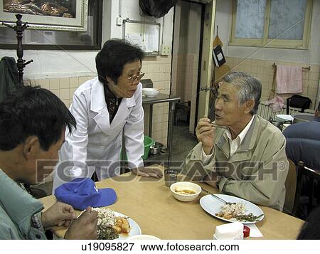 Stock Photo - kitchen, hand, soup, korea, person, people. Fotosearch
