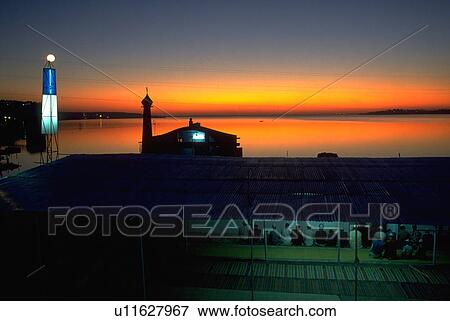 Stock Photo - lake, muslim, sunset, india, prayer, people. Fotosearch