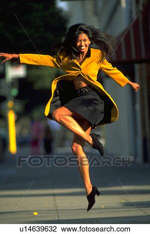 Stock Image - leaping, fashion, beauty, dance, sport, woman. Fotosearch