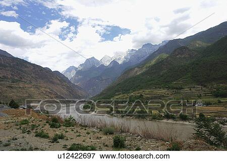 Stock Photo - leaping, nature, tiger, china, person, people. Fotosearch