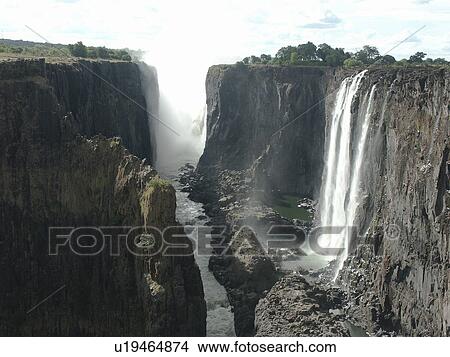 Picture - livingstone, person, falls, victoria, zambia, people. Fotosearch