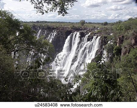 Stock Photo - livingstone, person, falls, victoria, zambia, people. Fotosearch
