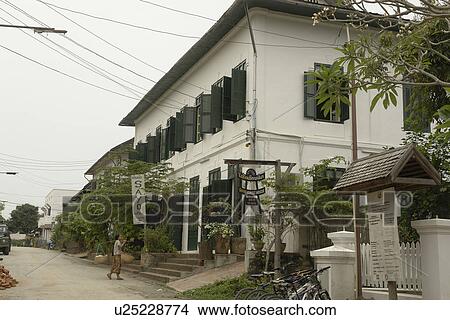 Picture - luang, house, traditional, laos, person, people. Fotosearch