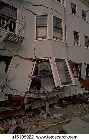 Stock Image - male, building, collapsed, entering, nature. Fotosearch