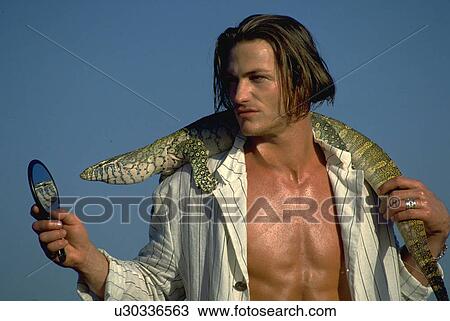 Stock Image - male, lizard, nile, monitor, beach. Fotosearch